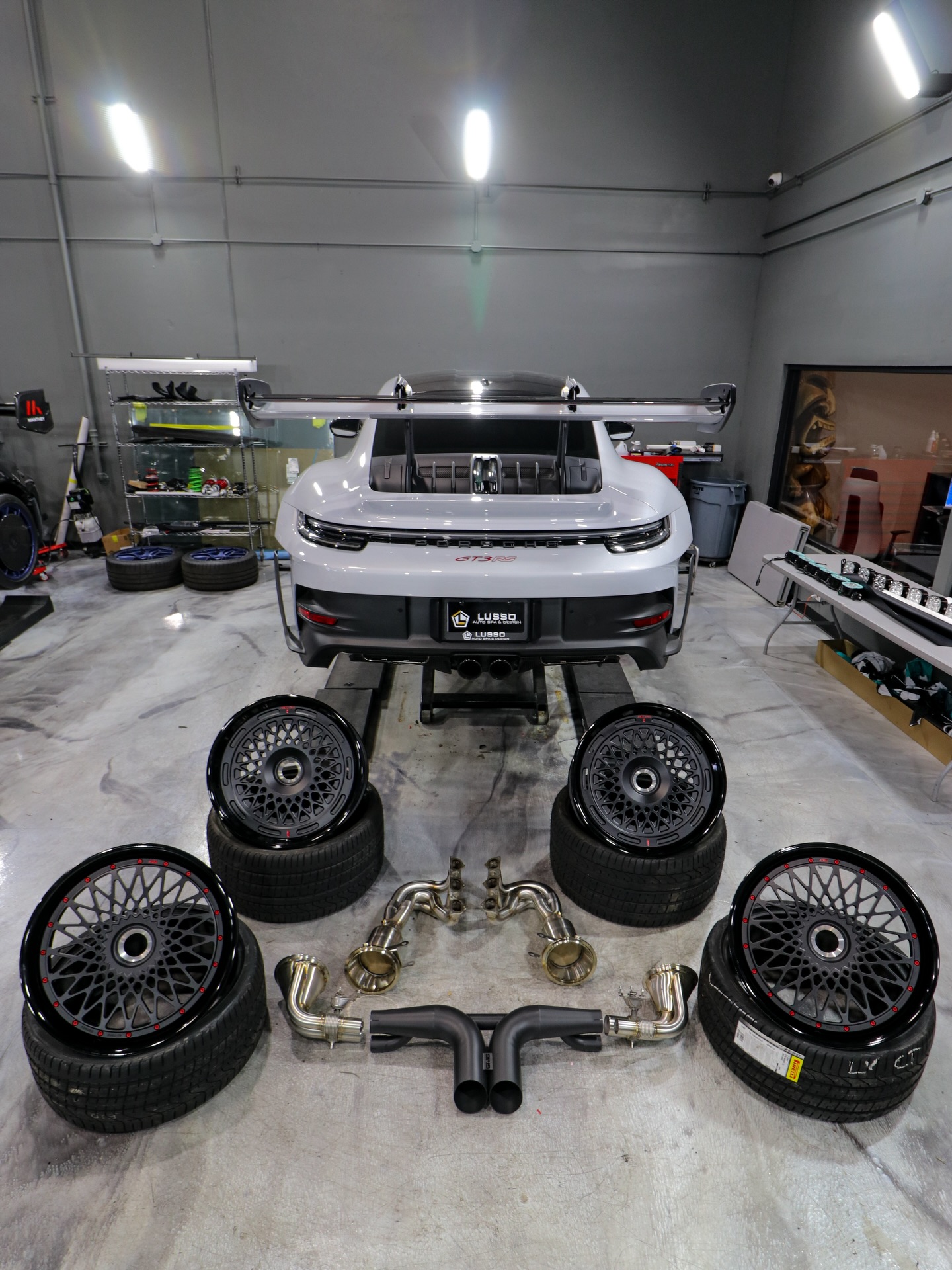 Porsche GT3 RS with custom wheels and exhaust components at Lusso Auto Design