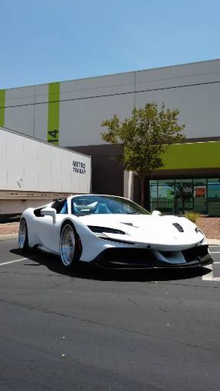 White Ferrari build outside Lusso Auto Design