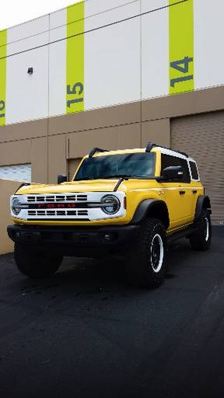 Yellow Ford Bronco customized by Lusso Auto Design